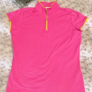 Nike Women's Pink Short Sleeve golf Top with Yellow Zipper.